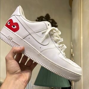 White Sneakers with Red Heart Logo